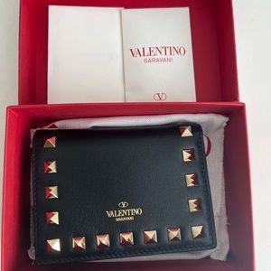 Brand new never used Valentino stud wallet, box and certificates